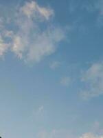 The white clouds on the blue sky are perfect for the background.  Skyscape on Lombok Island, Indonesia photo