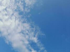 The white clouds on the blue sky are perfect for the background.  Skyscape on Lombok Island, Indonesia photo