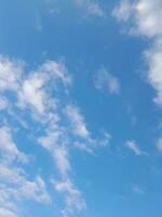 The white clouds on the blue sky are perfect for the background.  Skyscape on Lombok Island, Indonesia photo