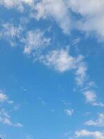 The white clouds on the blue sky are perfect for the background.  Skyscape on Lombok Island, Indonesia photo