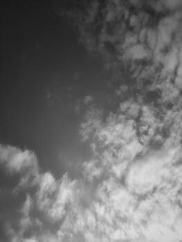 Beautiful grey clouds on sky background. Large bright soft fluffy clouds are cover the entire sky. photo