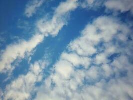 The white clouds on the blue sky are perfect for the background.  Skyscape on Lombok Island, Indonesia photo