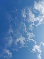 The white clouds on the blue sky are perfect for the background.  Skyscape on Lombok Island, Indonesia photo