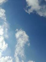 The white clouds on the blue sky are perfect for the background.  Skyscape on Lombok Island, Indonesia photo