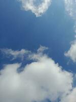 The white clouds on the blue sky are perfect for the background.  Skyscape on Lombok Island, Indonesia photo