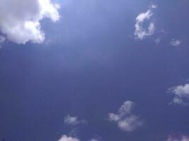 The white clouds on the blue sky are perfect for the background.  Skyscape on Lombok Island, Indonesia photo