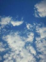 The white clouds on the blue sky are perfect for the background.  Skyscape on Lombok Island, Indonesia photo