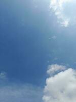 The white clouds on the blue sky are perfect for the background.  Skyscape on Lombok Island, Indonesia photo