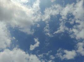 The white clouds on the blue sky are perfect for the background.  Skyscape on Lombok Island, Indonesia photo