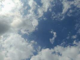 The white clouds on the blue sky are perfect for the background.  Skyscape on Lombok Island, Indonesia photo