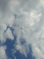 The white clouds on the blue sky are perfect for the background.  Skyscape on Lombok Island, Indonesia photo