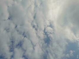 The white clouds on the blue sky are perfect for the background.  Skyscape on Lombok Island, Indonesia photo