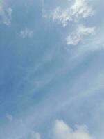 The white clouds on the blue sky are perfect for the background.  Skyscape on Lombok Island, Indonesia photo