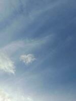 The white clouds on the blue sky are perfect for the background.  Skyscape on Lombok Island, Indonesia photo