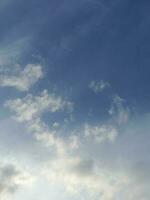 The white clouds on the blue sky are perfect for the background.  Skyscape on Lombok Island, Indonesia photo