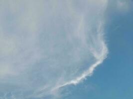 The white clouds on the blue sky are perfect for the background.  Skyscape on Lombok Island, Indonesia photo