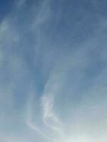 The white clouds on the blue sky are perfect for the background.  Skyscape on Lombok Island, Indonesia photo