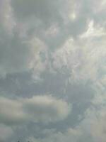 The white clouds on the blue sky are perfect for the background.  Skyscape on Lombok Island, Indonesia photo