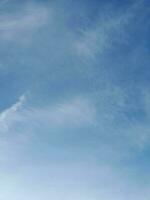 The white clouds on the blue sky are perfect for the background.  Skyscape on Lombok Island, Indonesia photo