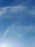 The white clouds on the blue sky are perfect for the background.  Skyscape on Lombok Island, Indonesia photo