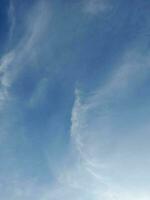 The white clouds on the blue sky are perfect for the background.  Skyscape on Lombok Island, Indonesia photo