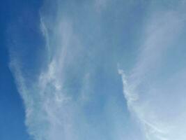 The white clouds on the blue sky are perfect for the background.  Skyscape on Lombok Island, Indonesia photo