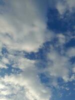 The white clouds on the blue sky are perfect for the background.  Skyscape on Lombok Island, Indonesia photo