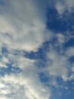 The white clouds on the blue sky are perfect for the background.  Skyscape on Lombok Island, Indonesia photo