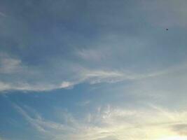 The white clouds on the blue sky are perfect for the background.  Skyscape on Lombok Island, Indonesia photo