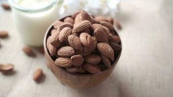 almond nut and milk on table video