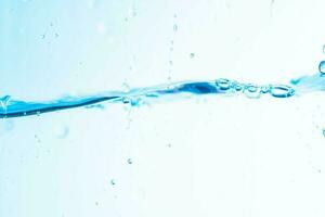 Background image of moving water in waves isolated on white background, clear water, water bubbles,macro photo