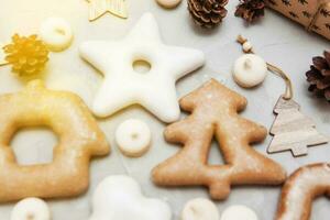 Banner for Christmas and New Year gingerbread stars, houses, Christmas trees, toys on a gray concrete background photo