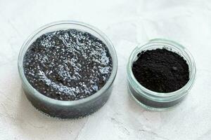 Black chia pudding with activated charcoal powder photo
