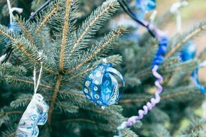 DIY handmade decoration on a Christmas tree photo