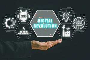 Digital revolution concept, Business person hand holding digital revolution icon on virtual screen. photo