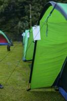 Rows of tents are built for sleeping when carrying out holidays with family. photo