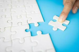 Human hands holding jigsaw with word problem  solution. symbol of association and connection. business strategy. photo