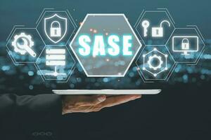 SASE, Secure Access Service Edge concept, Person hand using tablet with Secure Access Service Edge icon on virtual screen background, password, network, framework and support. photo