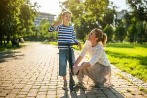 Mother and son playing in the park photo