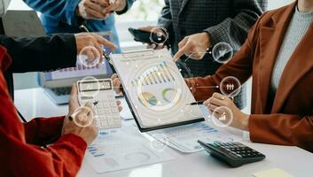 Working team meeting concept, business using laptop and smart phone and digital tablet computer with digital marketing media  in virtual icon network diagram office photo