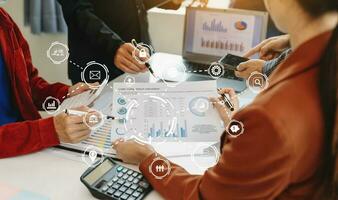 Working team meeting concept, business using laptop and smart phone and digital tablet computer with digital marketing media  in virtual icon network diagram office photo