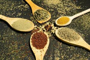 fresh and dried herbs and spices from all over the world photo