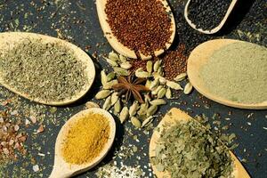 fresh and dried herbs and spices from all over the world photo