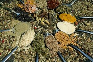 fresh and dried herbs and spices from all over the world photo