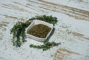 dried and fresh Thymus vulgaris delicious kitchen herbs photo