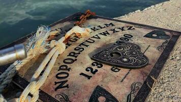 Spiritual Scary Witchcraft Ouija Board in Outdoor Concept video