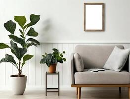 Cropped shot of cozy living room with mock up frame on white wall and plant pot. photo