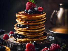 A stack of pancakes with berries on wooden wood. photo