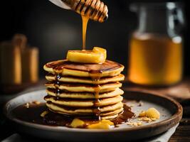 Banana pancakes drizzled with honey. photo