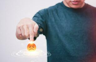 Satisfaction survey and customer service concept, businessman using a smartphone to answer the questionnaire and were dissatisfied with the service, giving the least satisfaction rating, very angry photo